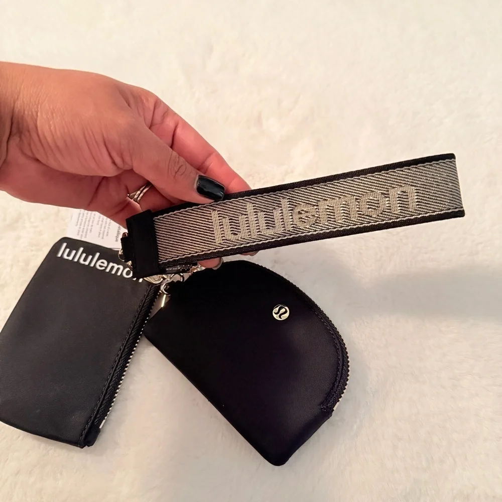 Lululemon Black Dual Pouch Wrislet Wordmark with Gold Accents